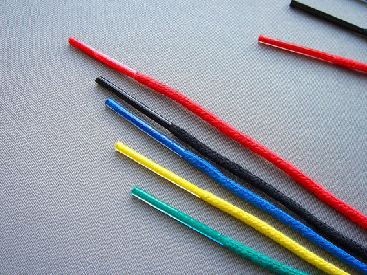 つづりひも セル先 450mm 100本入り